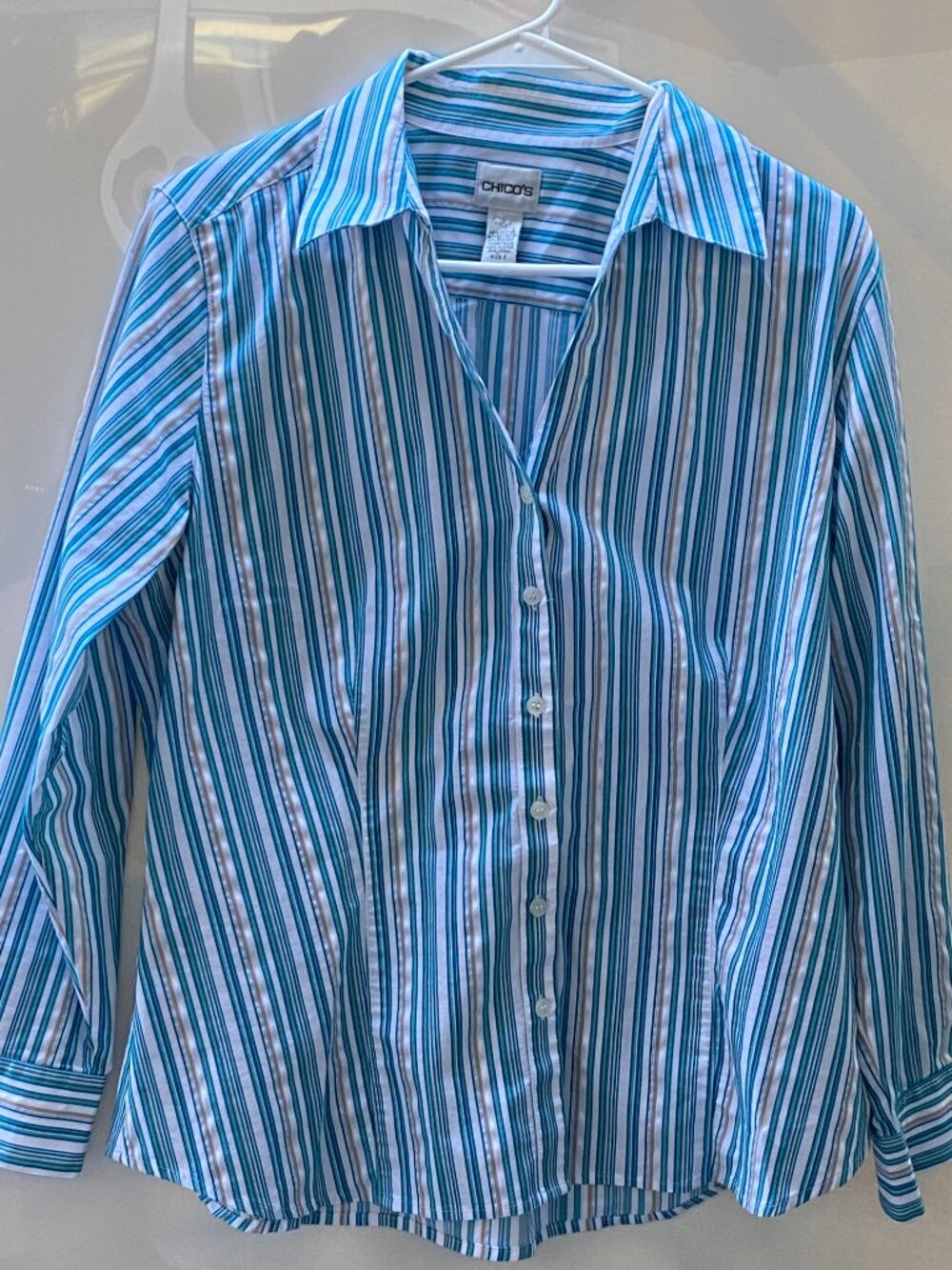 Chicos size 2 (12/large) button down shirt in teal, aqua, and tan stripes